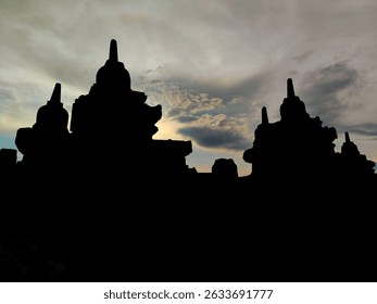 Silhouette of Ancient Temple Stupas at Sunset