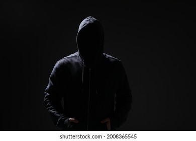 Silhouette of anonymous man on black background