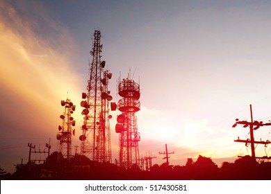 silhouette antennas on sunset time and sky on sunset time background.