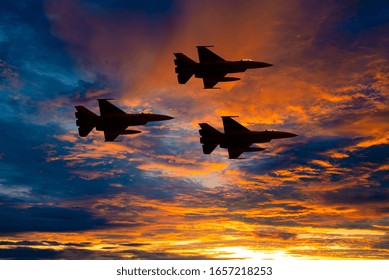 Silhouette army Show performant of air craft in air show with twilight sky background. - Powered by Shutterstock