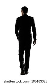 Silhouette of Asian business man walk with confidence, full length portrait isolated on white. Rear view.