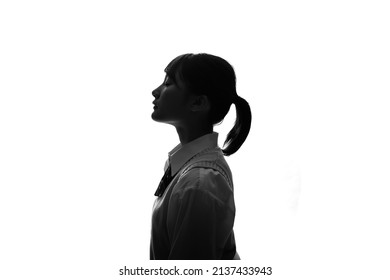 Silhouette Of Asian High School Girl.