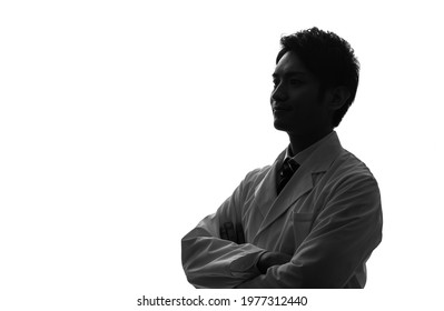 Silhouette of asian people wearing white robe. - Shutterstock ID 1977312440