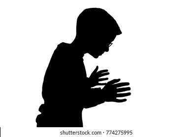 Silhouette of astonished boy isolated at white  background.