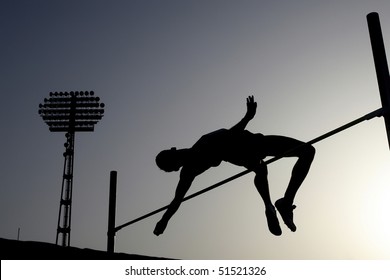 Silhouette of athlete competing in pole vault - Powered by Shutterstock