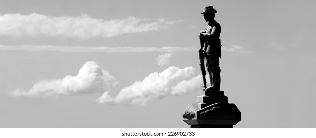 Silhouette Of Australian Soldier Sculpture From WW2 In ANZAC Square In Broadwater Parklands Gold Coast Queensland Australia. No People. Copy Space