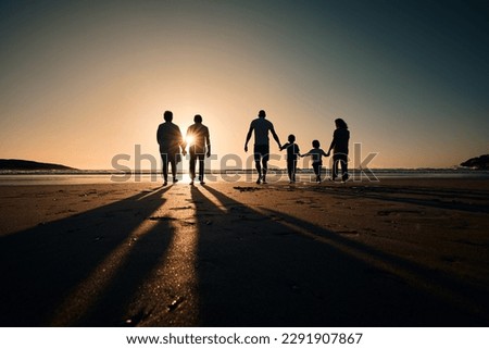 Silhouette, beach and big family holding hands in sunset on a holiday or vacation at sea or ocean together. Travel, love or shadow of people at sunrise in support, freedom and bonding by water mockup