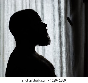 Silhouette Of Bearded Bald Man