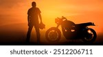 Silhouette of Biker, motorbike parking with sunset background in Thailand. Young Traveller man standing and holding helmet beside motorcycle. Trip and lifestyle of motorbike concept-banner image.