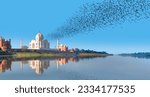 Silhouette of birds flying over Yamuna river - Taj Mahal mausoleum reflected in Yamuna river with many birds - Agra, Uttar Pradesh, India