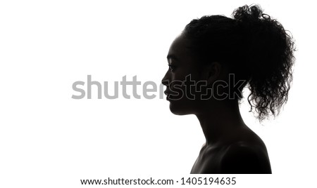 Silhouette of a black girl. Beauty concept.