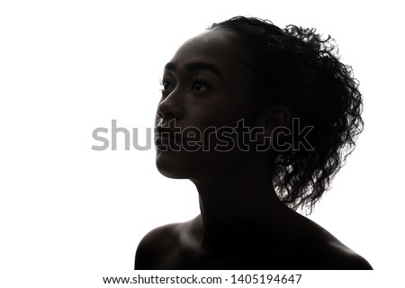 Silhouette of a black girl. Beauty concept.