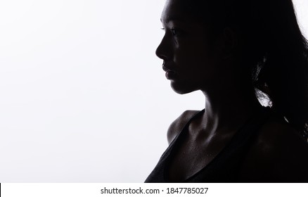 Silhouette Body Of Young Fitness Woman Who Has Hot Sweat From Exercise, Sweaty On Neck Chest Part. High Contrast White Background Copy Space