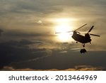 Silhouette of an Boeing CH-47 Chinook helicopter at the largest air festival in Lleida, Catalonia, Spain