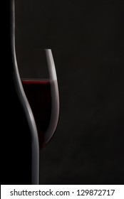 Silhouette of a Bottle and Red Wine Glass