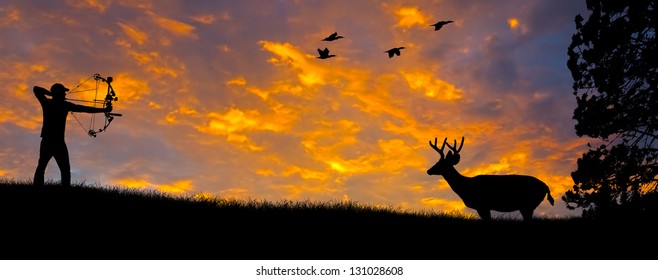 Silhouette Of A Bow Hunter Aiming At A White Tail Buck Against An Evening Sunset.