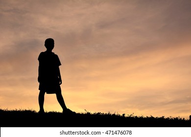 Silhouette Boy Alone In Sunset