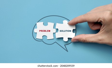 Silhouette of the brain and puzzles with inscriptions: problem and solution. A symbol of a difficult task and the search for its solution - Shutterstock ID 2048209559