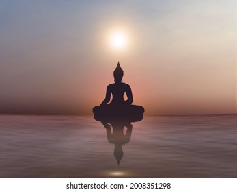 Silhouette of Buddha statue on golden sunset at river.Buddhism background