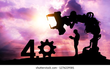 Silhouette of business man command automation robot arm machine technology , industry 4.0 , artificial intelligence trend concept. Sunrise twilight background. - Shutterstock ID 1276229581