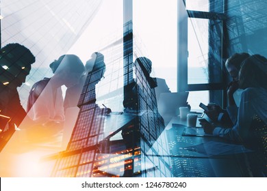 Silhouette of business people work together in office. Concept of teamwork and partnership. double exposure with light effects - Shutterstock ID 1246780240