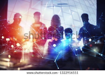 Silhouette of business people work together in office. Concept of teamwork and partnership. double exposure with network effects