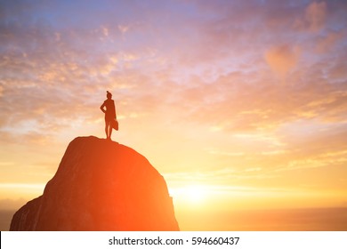 Silhouette Of Business Woman Look Somewhere On The Mountain