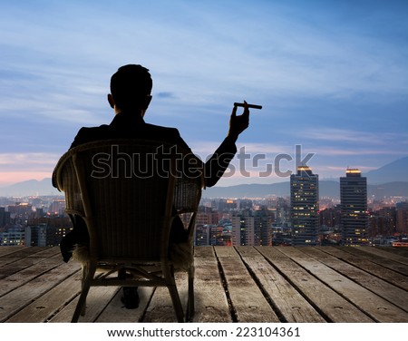 Similar – Image, Stock Photo Businessman smoking cigar in street cafe