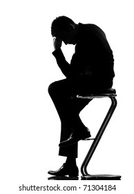 Silhouette Caucasian Business Man Thinking Pensive Sititting On Foot Stool Full Length On Studio Isolated White Background