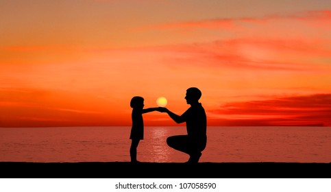 Silhouette Of The Child With The Father On A Sunset