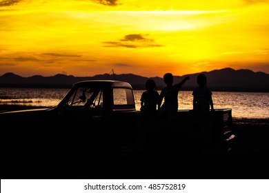 Silhouette Child Sitting In Pickup Truck