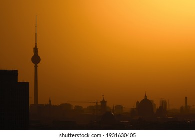 Silhouette Of A City Scape View Of Berlin In The Morning At Sunrise. 