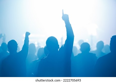 Silhouette Of Concert Crowd Raving On Dance Floor In Night Club. Download Stock Photo Of Music Fans Partying On Festival In Nightclub. Royalty Free Image Of Happy Audience On Popular Rock Show In Hall