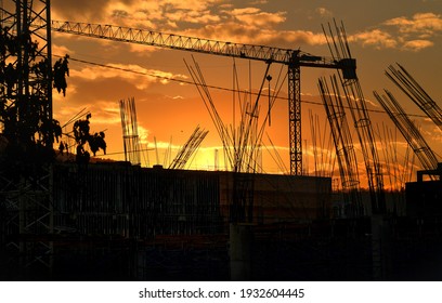Silhouette construction industry Construction cranes and buildings