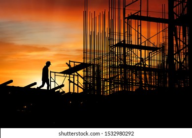 Silhouette Construction Site,Construction Workers Were Walking To Rest After Work Was Done In The Evening.