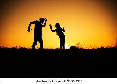 Silhouette Couple. Fight. Sunset. Angry Man.