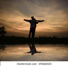 silhouette couple is standing