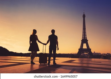 Silhouette Of Couple Of Tourists In Paris, Romantic Getaway Travel In France