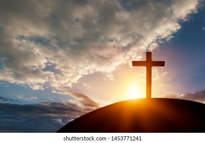 Silhouette Cross On Calvary Mountain Sunset Background. Easter Concept
    
    - Image