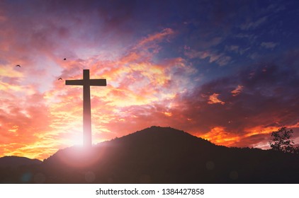 Silhouette The Cross On Sunset Background