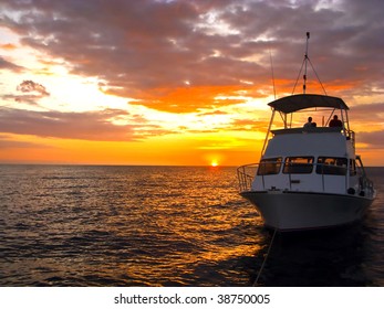 Silhouette Dive Boat In Hawaii Off Of Kona