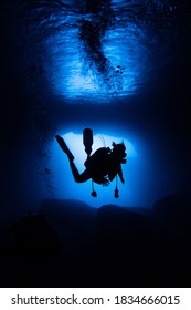 Silhouette Of Diver In The Cave While Diving On Gozo