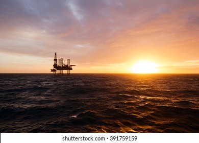 Silhouette of a drilling rig
