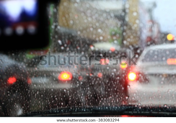 \
Silhouette edge Bokeh The rain \
on the road in the morning. In Thailand.Abstract blurred background\
: Traffic jam in the morning rush hour.\
in-Thailand.