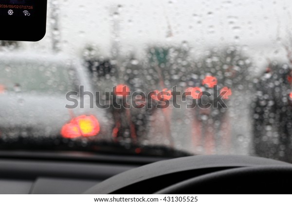 \
Silhouette edge The rain is\
falling. Bokeh on the road in the morning. In Thailand.Abstract\
blurred background : Traffic jam in the morning rush hour.\
in-Thailand.