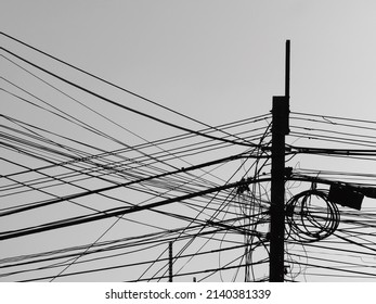 Silhouette Of Electric Wire On Street Electric Pole