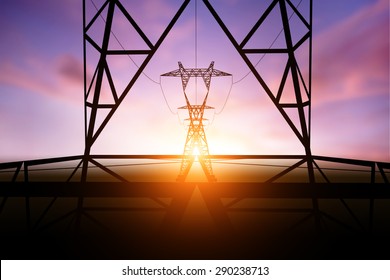 silhouette electricity post on sunset background