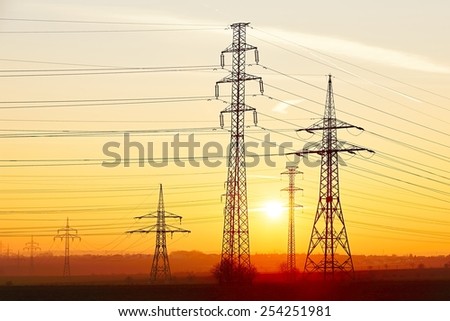 Sunset view of power lines from a Spanish hydro plant