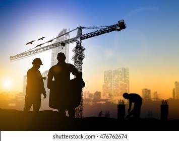 Silhouette Engineer Construction Site Over Blurred Construction Worker On Construction Site