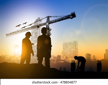 Silhouette Engineer Construction Site Over Blurred Construction Worker On Construction Site